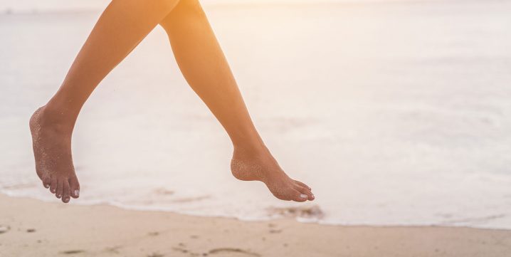 Image de jambes sur la plage