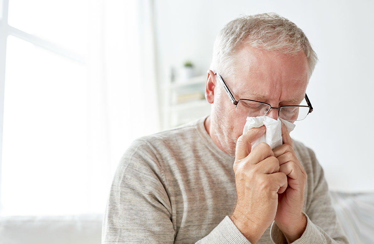 Elderly person having the flu