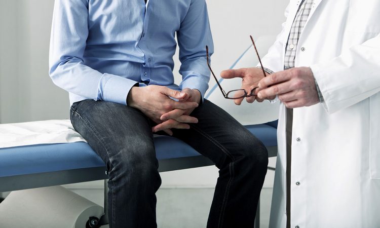 Man in consultation with a doctor